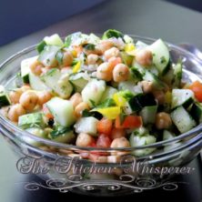 This Cucumber Chickpea Summer Salad is perfect for a cookout, as a side dish or as a main dish on a warm evening! Want protein, this is amazing with shrimp and chicken!