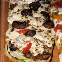 Pin to save this French Bread Garden Pizza