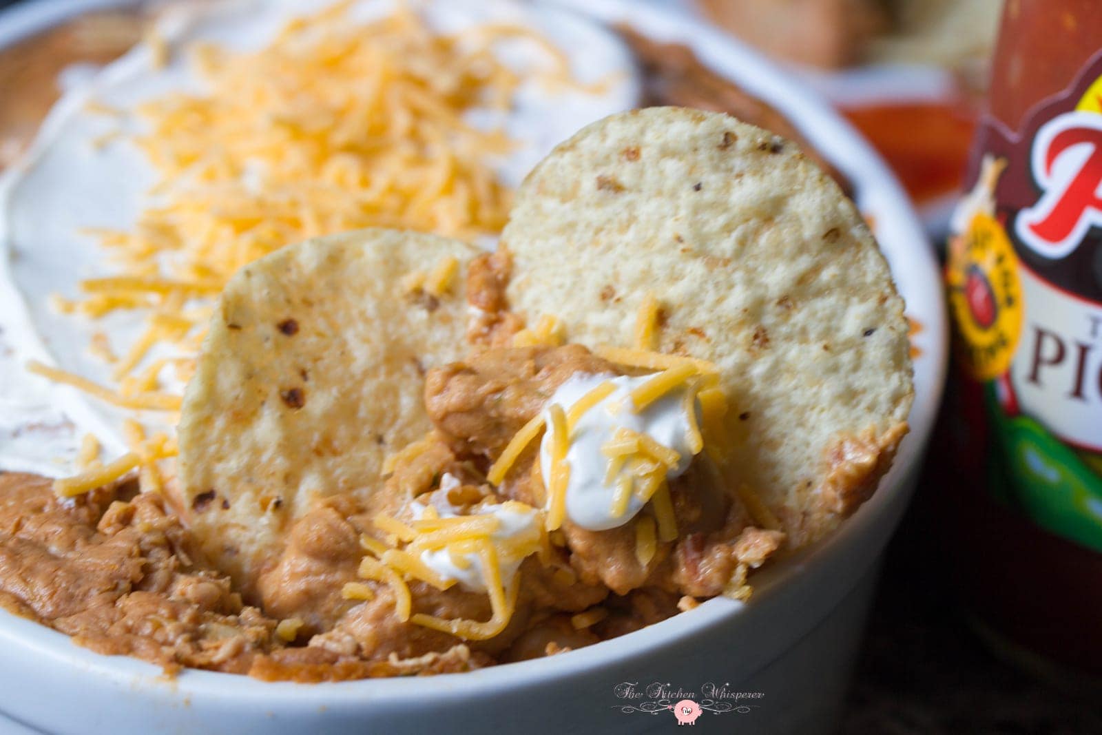 This is the ULTIMATE Bean Dip! Double beans, 3 types of cheese, picante sauce and spices! best bean dip, mexican bean dip, bean and cheese party dip,