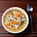 This Instant Pot Hearty Chicken, Veggies and Wild Blend Rice Soup recipe is done in minutes. Ladle up a bowl of this rich, flavor-packed soup today! It's the perfect comfort food!