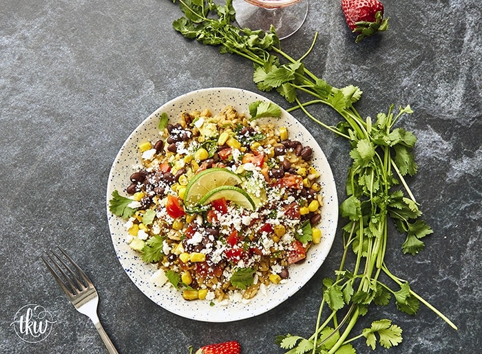 These Mexican Veggie Rice Bowls are flavor-packed with seasoned rice, roasted corn, black beans, garden-fresh salsa fresca, Cotija and a kiss of lime. Perfect for meal prep and light, and healthy lunch!