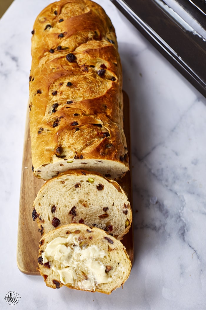 This Artisan Cranberry Pistachio Chocolate Chip Bread is a bread lover's dream! Slightly sweet & salty that's perfect for morning toast or for one amazing sandwich. Bakery style bread from scratch!
