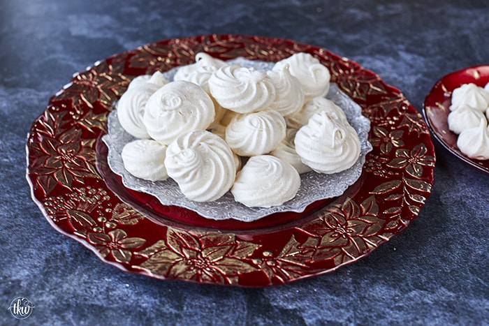 These French Vanilla Meringue Sandwich Cookies with Ganache filling are cloud-like treats that melt in your mouth with a slightly crisp outer shell, a slightly chewy center, and a decadent chocolate ganache filling.