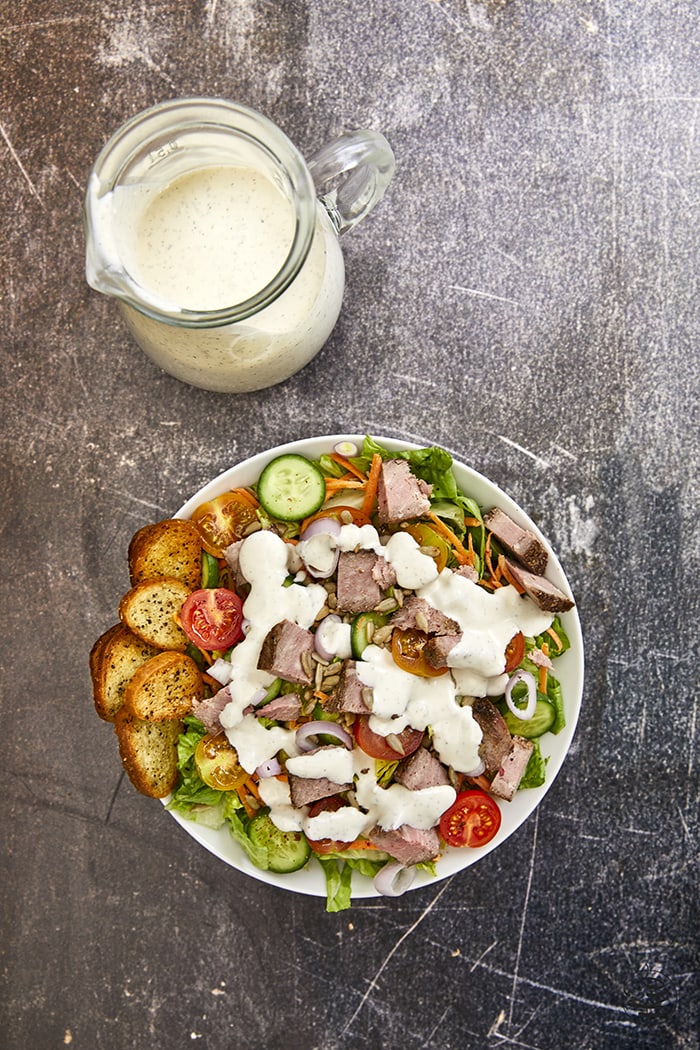 This creamy buttermilk feta dressing is loaded with herbs, feta cheese, and acid to make this the perfect salad dressing or dip! The Best Homemade Creamy Feta Dressing, feta dressing, feta dip, whipped feta, herb feta dressing, buttermilk feta salad dressing, from scratch dressing, Greek feta dressing