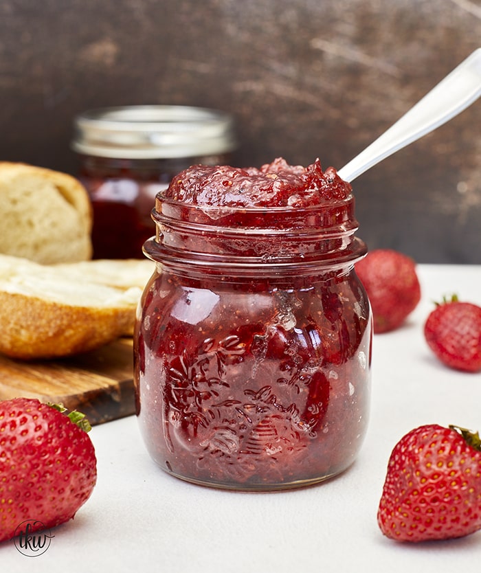 Sweet strawberries, acidic white balsamic vinegar, & spicy black pepper make this one of the most amazing jams you'll ever eat! From grazing boards to baked brie, atop grilled steak, or on a turkey sandwich, this jam will quickly become your favorite! Ultimate Strawberry Black Pepper Balsamic Jam, savory jam, homemade jam, strawberry jam with pectin, small batch strawberry jam. goat cheese jam, sandwich spread, savory jelly, pepper jelly, spicy pepper jelly, spicy pepper jam, strawberry chutney