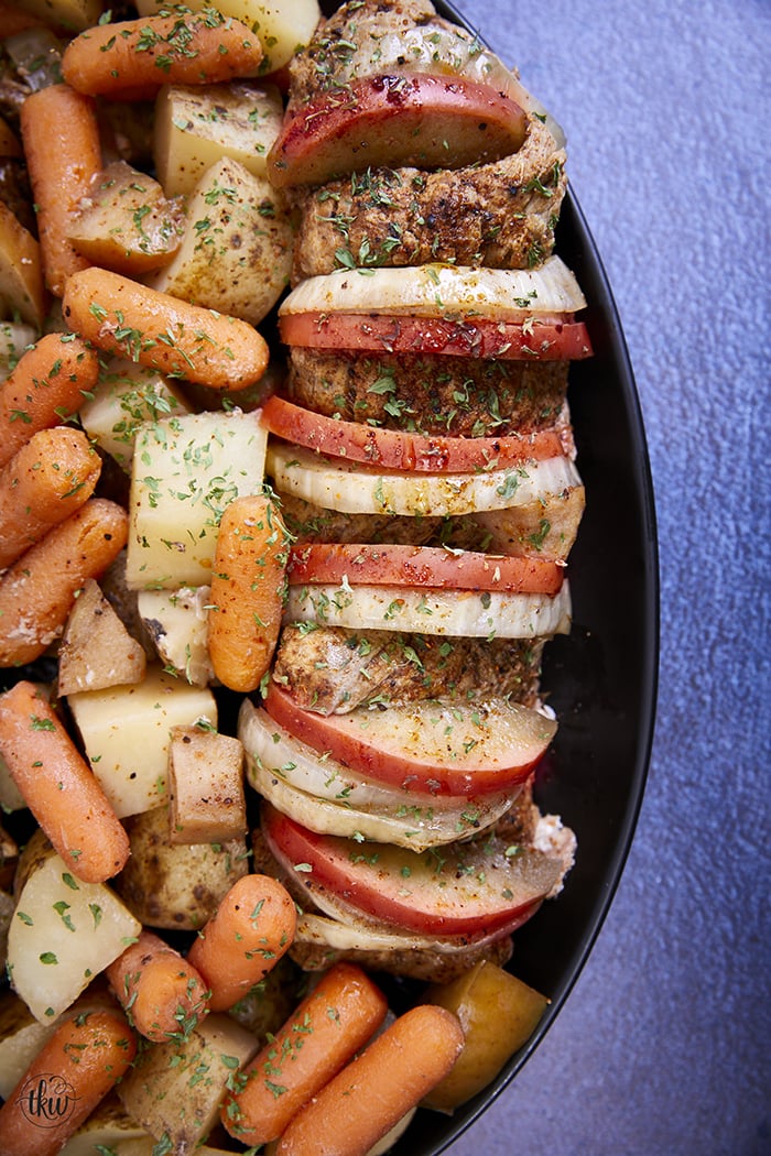The perfect fall family meal is here! Hasselback BBQ-spiced pork tenderloin stuffed with apples and onions then slow-cooked to perfection! Ultimate Slow Cooker Hasselback Apples & Onions Pork Tenderloin, crock pot pork tenderloin, harvest pork tenderloin, stuffed pork tenderloin, one-pan pork tenderloin, comfort foods, accordion pork tenderloin