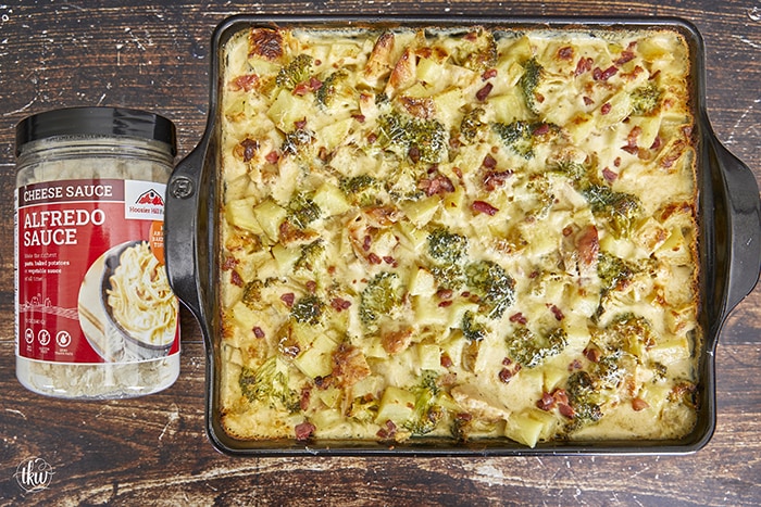 This has to be one of THE BEST one-pan recipes! Tender potatoes, broccoli, roasted chicken, and crispy bacon smothered in a cheesy Parmesan Alfredo sauce! Smothered Alfredo Chicken Casserole With Potatoes Bacon And Broccoli, smothered chicken, chicken casserole, one pan dinner, leftover chicken recipes, parmesan alfredo cheese sauce, comfort foods