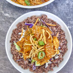 Tender shredded chicken bathed in a sweet & spicy BBQ sauce with bits of pineapple, mandarin oranges, and red onions make this an unforgettable and delicious recipe. Perfect for a quick weeknight dinner, wrap filling, nacho topping, or weekly meal prep protein! BBQ Hawaiian Shredded Chicken In The Instant Pot, pineapple chicken, sweet and spicy chicken, orange chicken, meal prep chicken, bbq chicken, pulled chicken, chicken wraps, chicken nachos, tangy bbq chicken