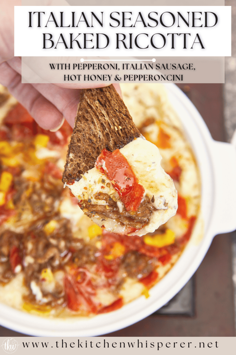 With fall and football season here, this cheesy baked ricotta dip is perfect for game day! Crispy pepperoni, crumbled Italian Sausage, and spicy pepperoncini baked on top of a cheesy ricotta spread and finished with a hot honey drizzle. Italian Seasoned Baked Ricotta with Double Meat and pepperoncini, hot italian dip, italian hoagie dip, football foods, hot ricotta dip, baked ricotta cheese dip, italian sausage dip, meat pizza dip