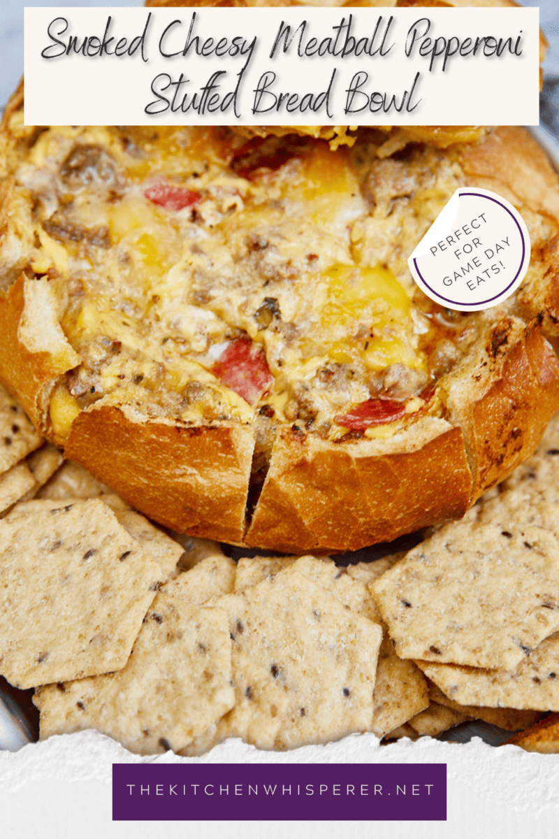 The perfect game-day dish! Grilled Italian crumbled meatballs, zesty pepperoni, & cheese stuffed in a bread bowl then smoked to cheesy perfection! The Best Smoked Cheesy Meatball Pepperoni Bread Bowl, grilled meatballs, cheesy bread bowl, football foods, game day appetizers, stuffed bread, big green egg smoked bread