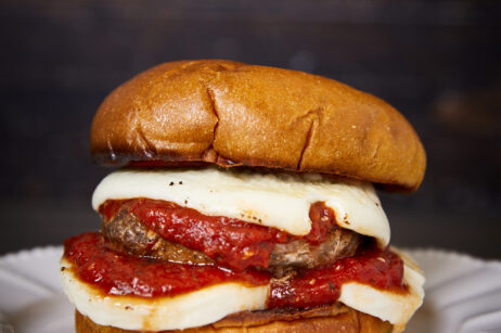 Mouth-watering and packed with flavor, these crafted loaded Italian sausage and beef burgers are elevating burger night! Stuffed with roasted red peppers, gooey cheese, and fresh spinach, these burgers make every bite a mouthwatering masterpiece! Ultimate Loaded Italian Sausage & Beef Burgers, sausage burgers, mozzarella burgers, Crafted burger recipe, Ultimate Burger, Grilled Burgers, Double Meat Burgers, best burger recipe