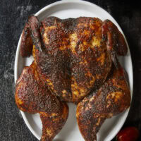 Level up your chicken dinner! Spatchcock-style smoked means a faster, more even cook, plus tips on how to get crispy skin on a pellet smoker. Grab my competition secret hot honey butter injection tips! It's the secret to getting incredibly tender, juiciest, flavorful chickens you'll ever eat!