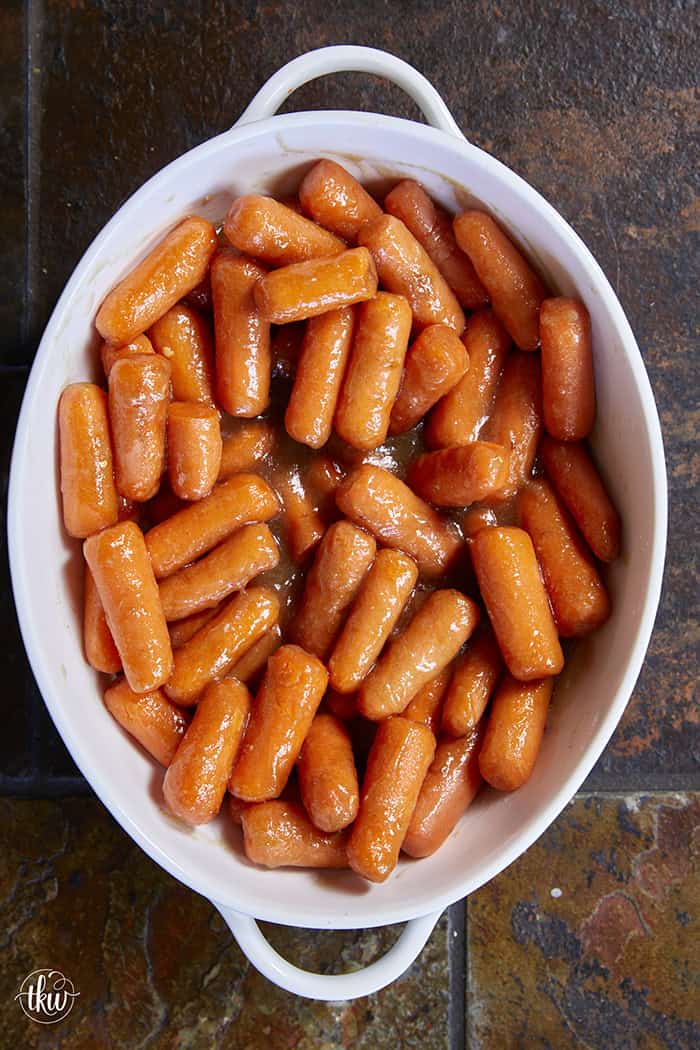 Turn ordinary carrots into something unforgettable! Roasted in a buttery, spiced maple sauce, then topped with toasted pistachios and a kiss of sea salt flakes, this side dish is guaranteed to steal the spotlight at any meal!