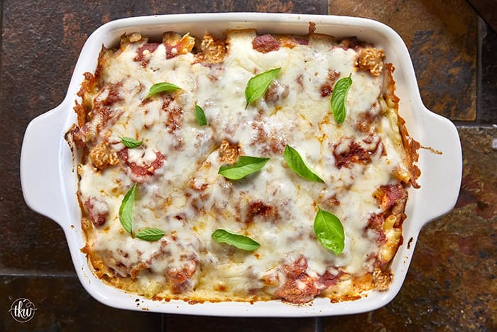 When you need something warm, hearty, & comforting that everyone will love, this dish always hits the spot. Layers of rich marinara, tender ziti, creamy three-cheese ricotta filling, and zesty Italian sausage come together to create a bubbling, irresistibly cheesy dinner everyone will love.