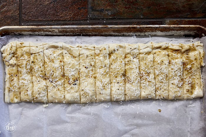 These cheese-stuffed breadsticks are the perfect blend of warm pizza dough, savory garlic butter, and gooey mozzarella for an irresistible bite! Made with simple pantry ingredients, they come together quickly for a delicious snack or the perfect side to any pizza or pasta night.