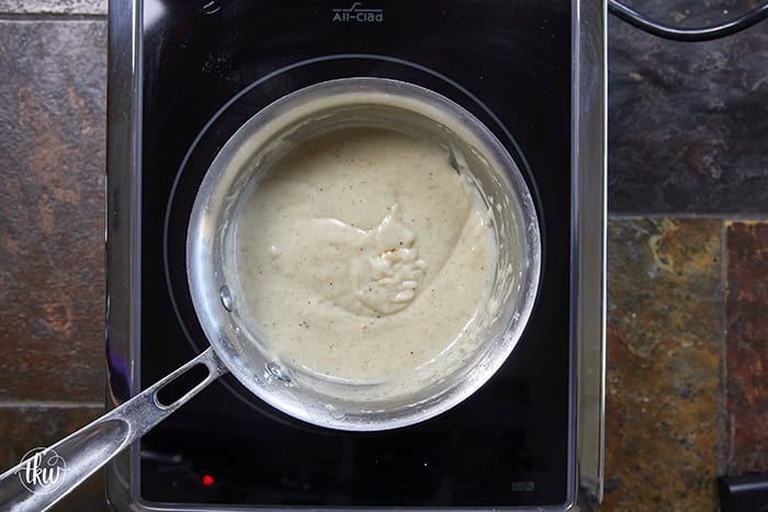 This from-scratch cream of chicken soup takes less than 10 minutes to make, uses five pantry staples, & tastes miles better than anything from a can. Made with real, budget-friendly ingredients, it's a rich, versatile base soup with endless recipe possibilities!