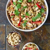 Fresh, crunchy, and bursting with bold flavor, this Thai-inspired Asian coleslaw features crisp cabbage, bell peppers, carrots, and crunchy peanuts all tossed in a creamy, spicy peanut butter dressing.