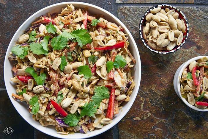 Fresh, crunchy, and bursting with bold flavor, this Thai-inspired Asian coleslaw features crisp cabbage, bell peppers, carrots, and crunchy peanuts all tossed in a creamy, spicy peanut butter dressing.