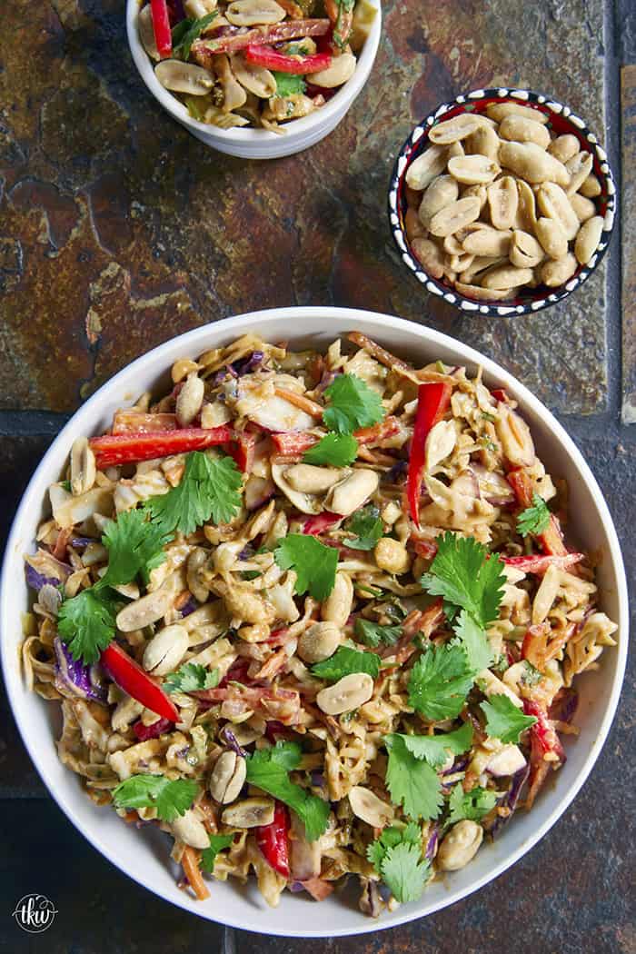 Fresh, crunchy, and bursting with bold flavor, this Thai-inspired Asian coleslaw features crisp cabbage, bell peppers, carrots, and crunchy peanuts all tossed in a creamy, spicy peanut butter dressing.