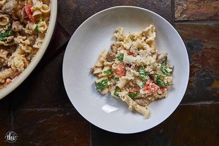 Made with Italian sausage, spinach, cherry tomatoes, and creamy Boursin cheese, this pasta is rich, comforting, and ready in under 30 minutes. It's an easy go-to for meal prep or a cozy night in.