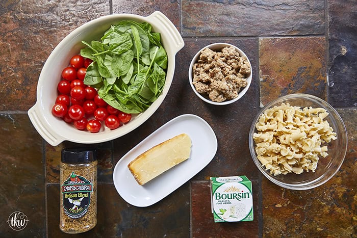 Made with Italian sausage, spinach, cherry tomatoes, and creamy Boursin cheese, this pasta is rich, comforting, and ready in under 30 minutes. It's an easy go-to for meal prep or a cozy night in.