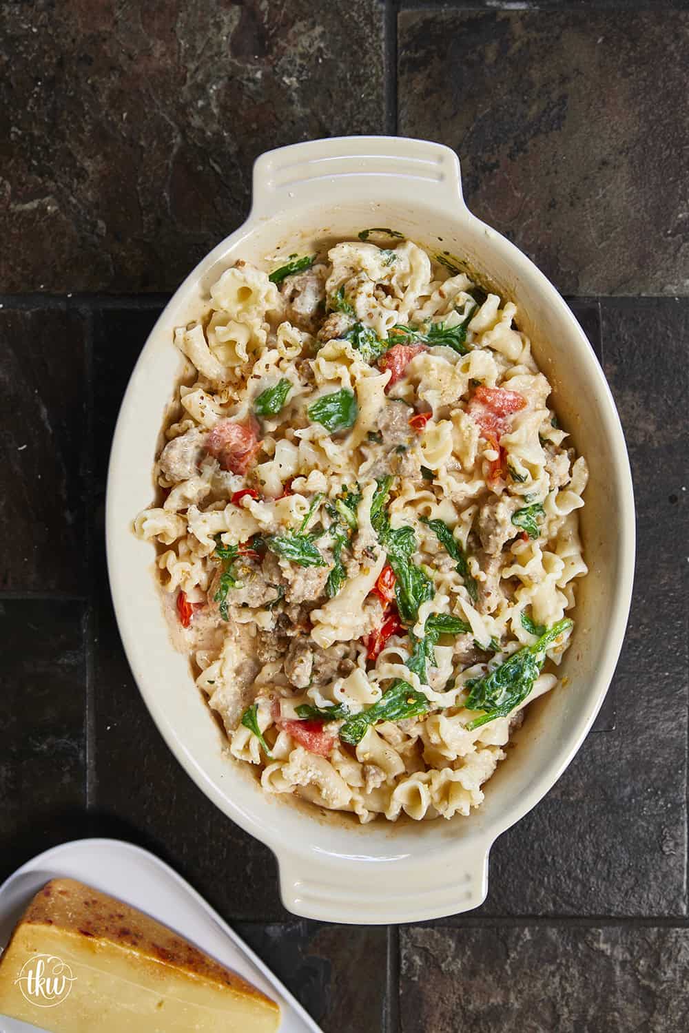 Made with Italian sausage, spinach, cherry tomatoes, and creamy Boursin cheese, this pasta is rich, comforting, and ready in under 30 minutes. It's an easy go-to for meal prep or a cozy night in.