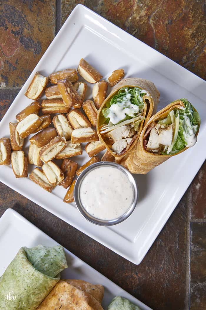 Juicy oven-baked chicken, crispy bacon, fresh lettuce, and creamy Parmesan-peppercorn dressing come together in a soft flour tortilla for the ultimate chicken wrap. These 6-ingredient wraps are perfect for meal prep, busy schedules, and grab-and-go bites!