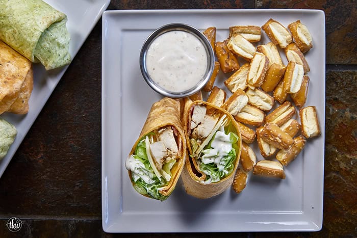 Juicy oven-baked chicken, crispy bacon, fresh lettuce, and creamy Parmesan-peppercorn dressing come together in a soft flour tortilla for the ultimate chicken wrap. These 6-ingredient wraps are perfect for meal prep, busy schedules, and grab-and-go bites!