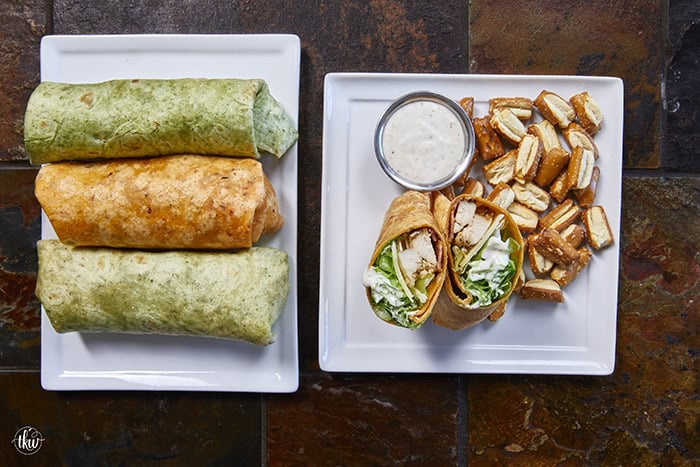 Juicy oven-baked chicken, crispy bacon, fresh lettuce, and creamy Parmesan-peppercorn dressing come together in a soft flour tortilla for the ultimate chicken wrap. These 6-ingredient wraps are perfect for meal prep, busy schedules, and grab-and-go bites!