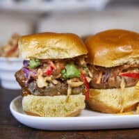 These Thai-inspired pork sliders feature juicy, umami-rich pork topped with a crunchy Asian peanut slaw and spicy peanut dressing. Fresh ginger, jalapeno, fish sauce, and cilantro create a balanced, crave-worthy bite you'll quickly fall in love with.
