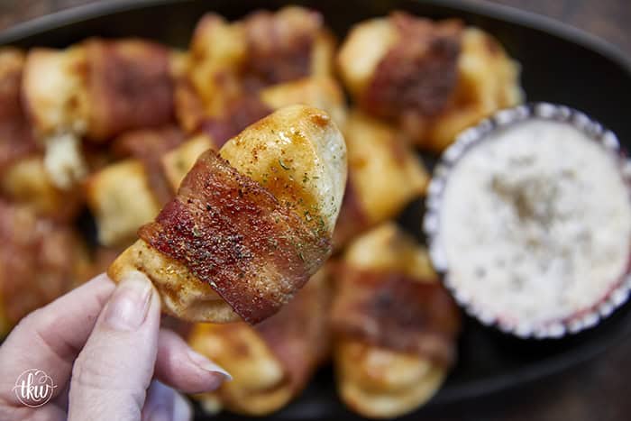 Crispy, creamy, and incredibly snackable, these baked bacon-wrapped pierogies are always the first to go. Made with just 3 simple ingredients, the pierogies stay soft and creamy on the inside while the seasoned bacon wrapping turns perfectly crispy. This is the bite that everyone keeps reaching for!