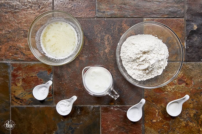 There is nothing quite like the smell of warm, buttery biscuits in the kitchen to bring back those childhood memories of Mom's kitchen. My family's tried-and-true buttermilk drop biscuits are pure love, with a golden crunch, a fluffy center, and a buttery bite!