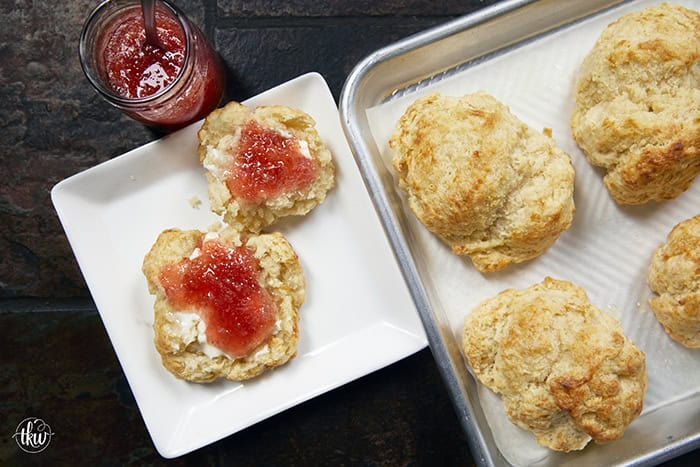 There is nothing quite like the smell of warm, buttery biscuits in the kitchen to bring back those childhood memories of Mom's kitchen. My family's tried-and-true buttermilk drop biscuits are pure love, with a golden crunch, a fluffy center, and a buttery bite!