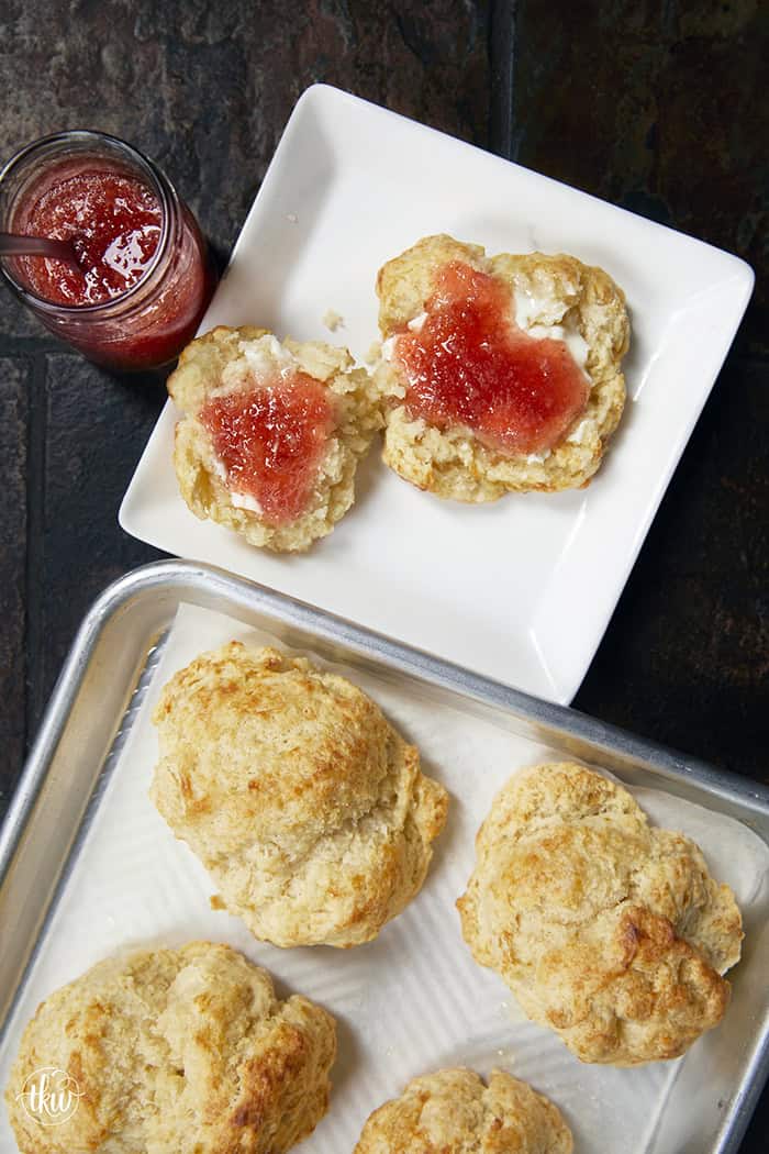 There is nothing quite like the smell of warm, buttery biscuits in the kitchen to bring back those childhood memories of Mom's kitchen. My family's tried-and-true buttermilk drop biscuits are pure love, with a golden crunch, a fluffy center, and a buttery bite!
