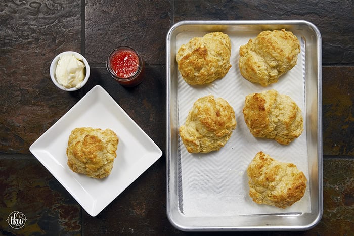 There is nothing quite like the smell of warm, buttery biscuits in the kitchen to bring back those childhood memories of Mom's kitchen. My family's tried-and-true buttermilk drop biscuits are pure love, with a golden crunch, a fluffy center, and a buttery bite!