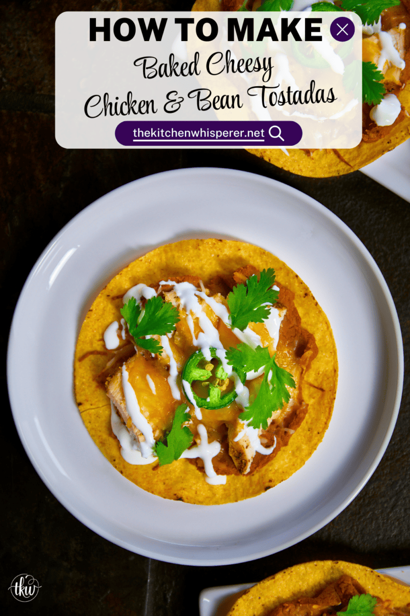 The crunch you've been craving! These Loaded Chicken and Bean Tostadas feature golden-baked shells, seasoned refried beans, juicy chicken, bubbly Mexican cheese, and spicy jalapeños. Finished with a cool sour cream sauce and fresh cilantro for that perfect creamy-meets-crunchy bite. If you love tacos, you have to try this 30-minute twist! #ChickenTostadas #30MinuteMeals #EasyMexicanRecipes #WeeknightDinnerIdeas #BudgetFriendlyCooking