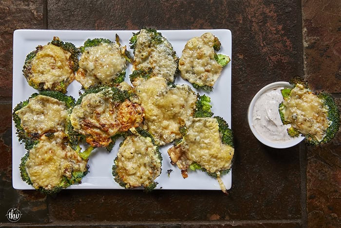 The vegetable recipe that will have everyone asking for seconds! 🥦🧀 These Crispy Parmesan Smashed Broccoli bites are steamed, smashed, and roasted until they form a golden, lacy cheese crust. Only 4 ingredients and 4 steps to the best healthy snack you've ever tasted! #SmashedBroccoli #ParmesanFrico #HealthySnacks #EasySideDish