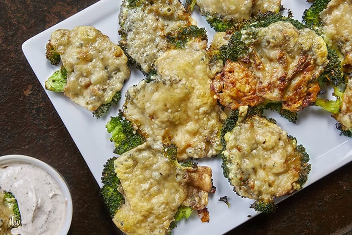 The vegetable recipe that will have everyone asking for seconds! 🥦🧀 These Crispy Parmesan Smashed Broccoli bites are steamed, smashed, and roasted until they form a golden, lacy cheese crust. Only 4 ingredients and 4 steps to the best healthy snack you've ever tasted! #SmashedBroccoli #ParmesanFrico #HealthySnacks #EasySideDish
