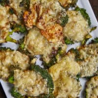 The vegetable recipe that will have everyone asking for seconds! 🥦🧀 These Crispy Parmesan Smashed Broccoli bites are steamed, smashed, and roasted until they form a golden, lacy cheese crust. Only 4 ingredients and 4 steps to the best healthy snack you've ever tasted! #SmashedBroccoli #ParmesanFrico #HealthySnacks #EasySideDish