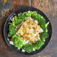 This honey garlic baked cod is flaky, caramelized on the edges, and honestly tastes way more expensive than it actually is. Transform your simple baked fish into an elegant meal any night of the week. #EasyRecipes #HealthyDinner #CodRecipe #honeygarlicsauce #stirfrysauce #bakedwhitefish
