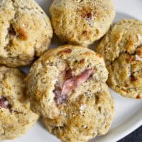 Taking my family's classic buttermilk drop biscuit recipe and give it a sophisticated, savory upgrade with savory ham, melted brie, fig jam, and black pepper. Perfect any time of the day, meal prep, and freeze meals. #ButtermilkBiscuits #BrunchRecipes #SavoryBaking #ComfortFood #stuffedbiscuits #hamandcheesebiscuits