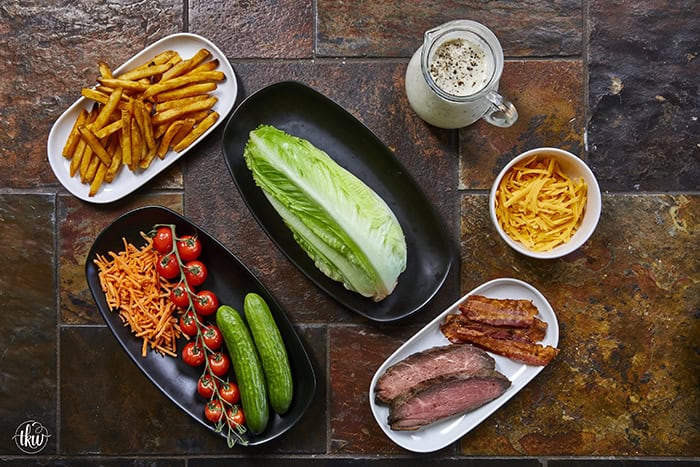 This authentic Pittsburgh Steak Salad features juicy, seared steak strips and a mountain of crispy, golden fries over fresh romaine , veggies, and cool ranch. It’s a Steel City classic that proves fries belong on everything! Perfect for a hearty lunch or a quick weeknight dinner. #PittsburghSteakSalad #SteelCityEats #FriesOnEverything #SaladGoals #EasyDinner