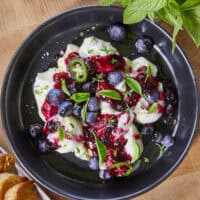 Creamy burrata meets a quick sweet-heat blueberry jalapeño jam, fresh basil, and earthy thyme. Finished with olive oil and flaky sea salt, this versatile plate is perfect for an elevated weekend brunch, a mid-day patio snack, or a gorgeous addition to your next charcuterie board. It looks restaurant-quality but comes together in less than 20 minutes! Head to the blog for the recipe, substitutions, and chef tips. #burrata #charcuterieboard #easyappetizers