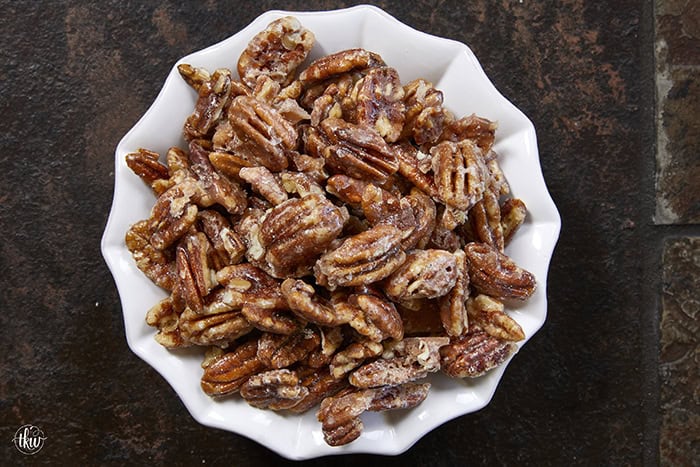 Give your pecans a major glow up! These 3-ingredient stovetop candied pecans take just 10 minutes in a single skillet—no oven required. They are the perfect crunchy, caramelized addition to elevate your salads, holiday snacks, or dessert toppings. Once you try this quick skillet method, you'll never go back to store-bought! #candiedpecans #easyrecipes #stovetoprecipes