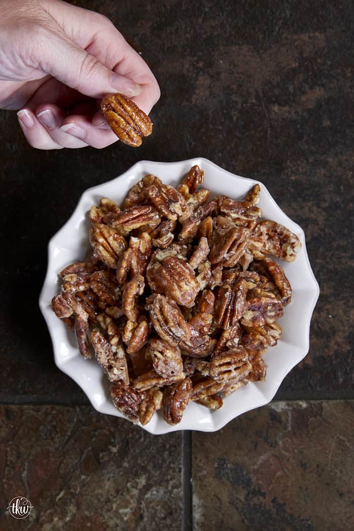 Give your pecans a major glow up! These 3-ingredient stovetop candied pecans take just 10 minutes in a single skillet—no oven required. They are the perfect crunchy, caramelized addition to elevate your salads, holiday snacks, or dessert toppings. Once you try this quick skillet method, you'll never go back to store-bought! #candiedpecans #easyrecipes #stovetoprecipes