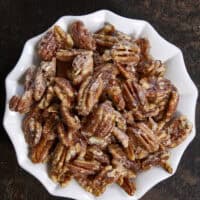 Give your pecans a major glow up! These 3-ingredient stovetop candied pecans take just 10 minutes in a single skillet&mdash;no oven required. They are the perfect crunchy, caramelized addition to elevate your salads, holiday snacks, or dessert toppings. Once you try this quick skillet method, you'll never go back to store-bought! #candiedpecans #easyrecipes #stovetoprecipes