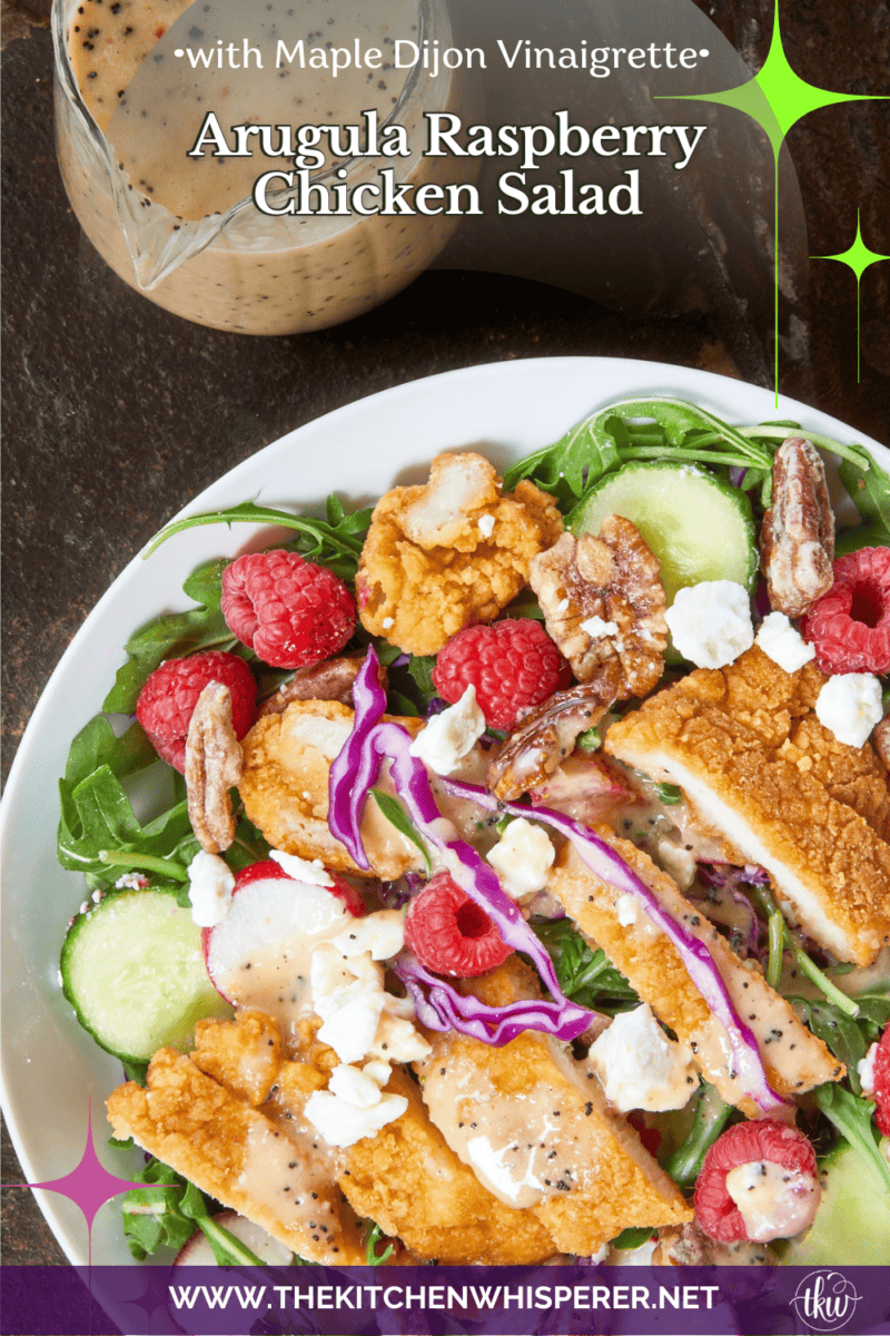 This Arugula Raspberry Chicken Salad is the perfect mix of sweet and savory. Tender chicken, juicy raspberries, sharp radishes, feta, & candied pecans topped with a homemade maple Dijon vinaigrette. #ChickenSaladRecipes #ArugulaSalad #SummerSalad