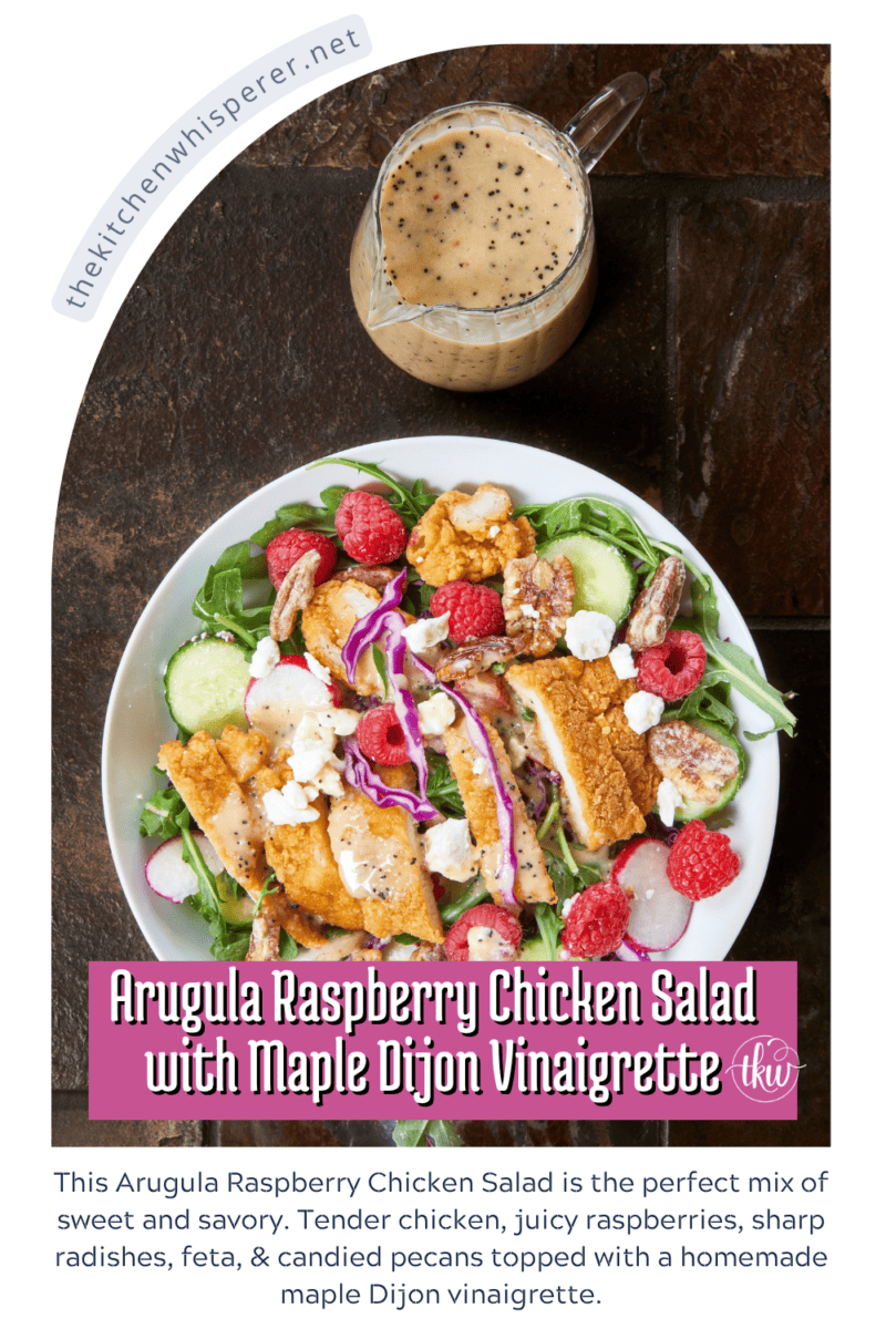 This Arugula Raspberry Chicken Salad is the perfect mix of sweet and savory. Tender chicken, juicy raspberries, sharp radishes, feta, & candied pecans topped with a homemade maple Dijon vinaigrette. #ChickenSaladRecipes #ArugulaSalad #SummerSalad