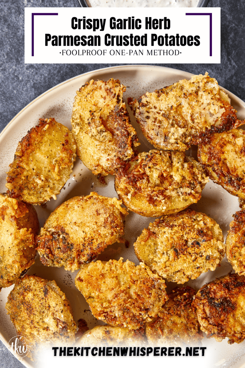 Shatteringly crisp on the outside, buttery soft on the inside! This simple, elegant parmesan crusted potato side dish creates a deeply golden, lacy frico crust with almost zero effort. No boiling required! Perfect for any night of the week. #parmesancrustedpotatoes #easysidedishes #roastedpotatoes