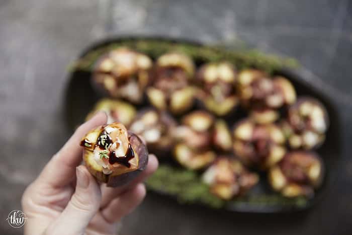 Elegant, easy, and ready in 15 minutes! Fresh figs are stuffed with fluffy whipped goat cheese, wrapped in savory prosciutto, and drizzled with balsamic glaze. Try this simple appetizer today!
